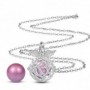 Collier bola de grossesse ailes d’anges cristaux boule rose